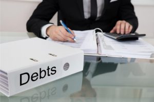 קשיים כלכליים לעסקים בחובות